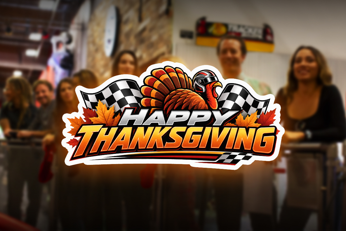 Happy Thanksgiving graphic featuring a turkey wearing a racing helmet, checkered flags, and autumn leaves over a blurred photo of guests at K1 Speed.